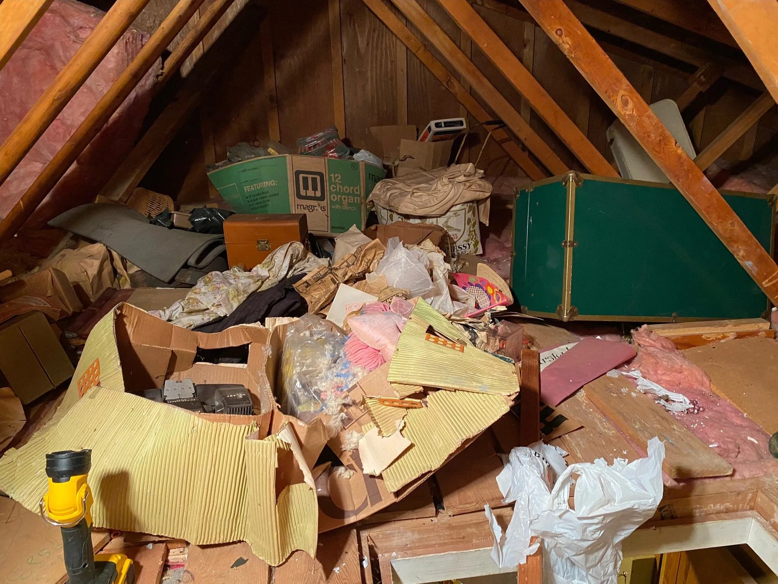 Attic packed with stored items before a Bison Dump cleanout in Salem