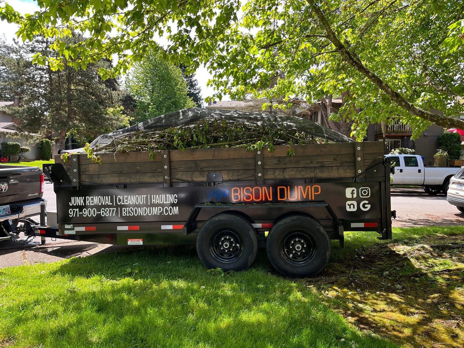 Trailer loaded with yard debris and branches hauled by Bison Dump in the Salem area